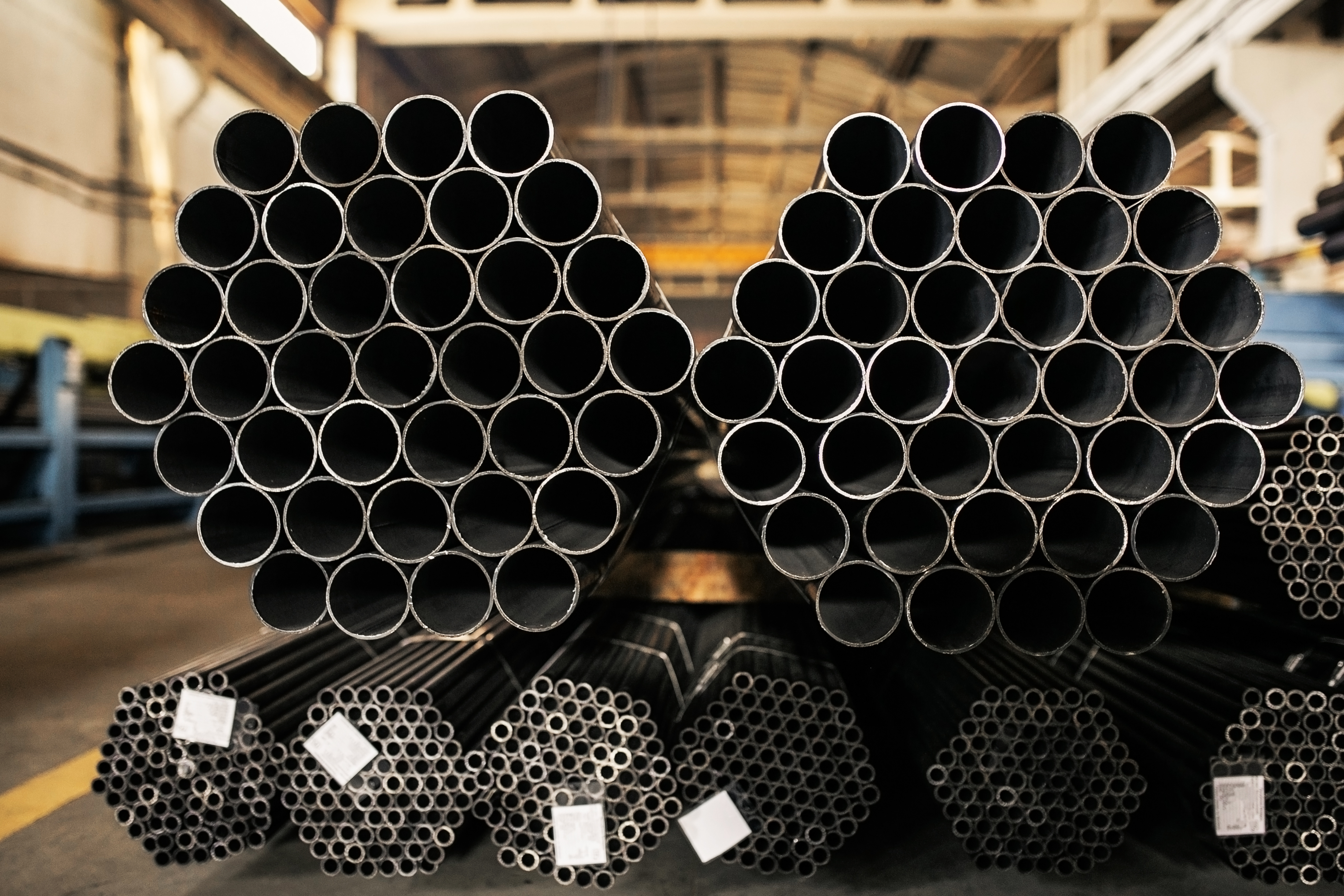 Metallic Pipes On Warehouse, Rows Of Metal Pipes On Industrial Warehouse. Industrial Interior,